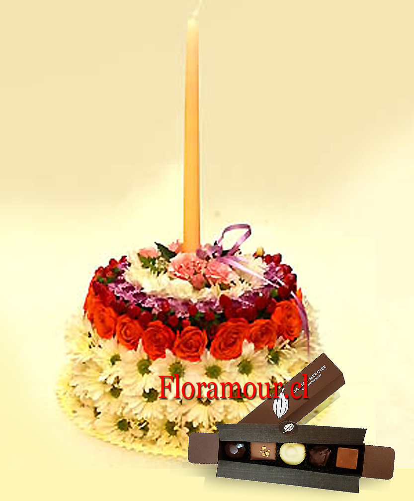 Sorprenda con este simp&aacute;tico arreglo de flores naturales y frescas, acompa&ntilde;ado de una cajita de chocolates Le Vice
Disponible solo en Santiago.