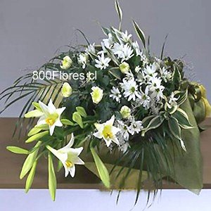 9 blooms of white lilies, 8 yellow carnations, daisies, and greens bouquet